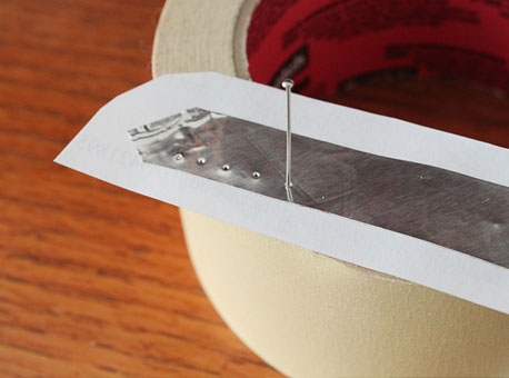 SharksTeethPunchingHoles